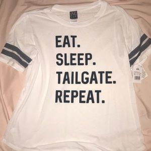 “Eat sleep tailgate repeat” graphic tee